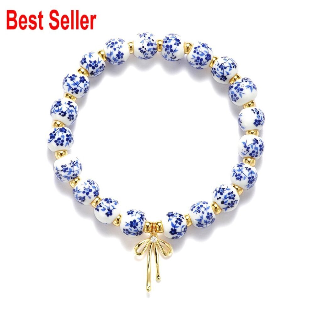 Handmade Stretch Beaded Bracelet with Gold Plated Bow Charm